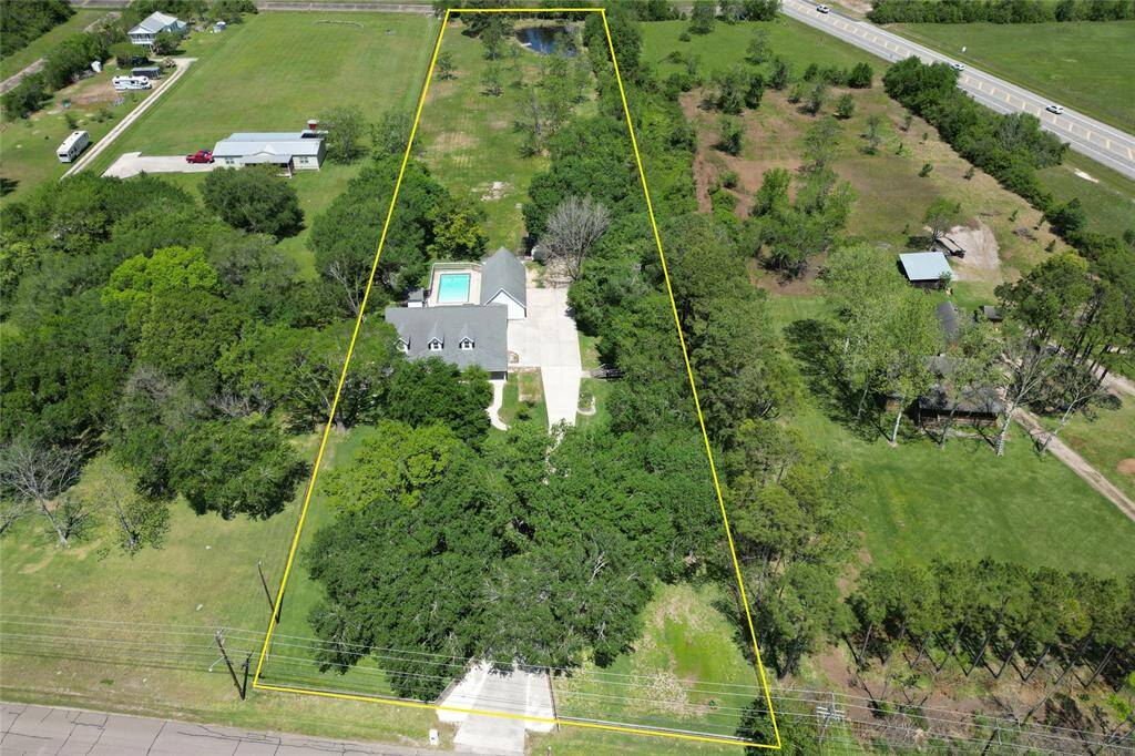 Welcome home 2350 Hewitt Street in League City, TX! 3.75 acres, fully fenced and no HOA.
