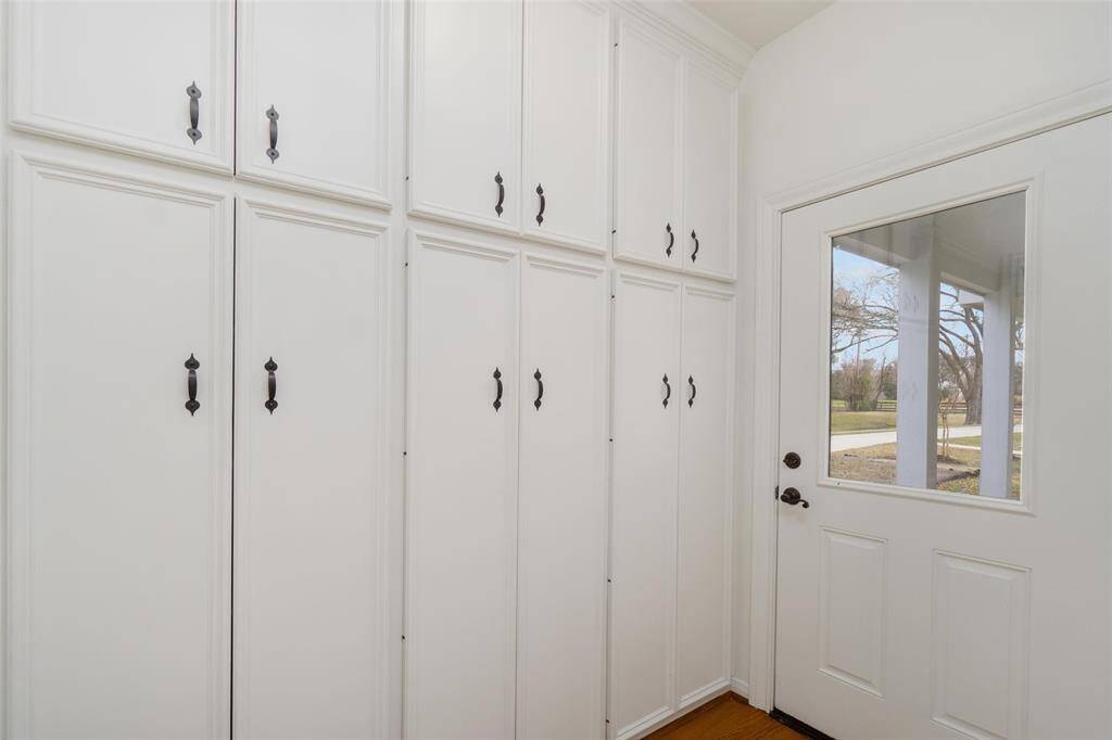 Mud room with side door access and wrap around porch.