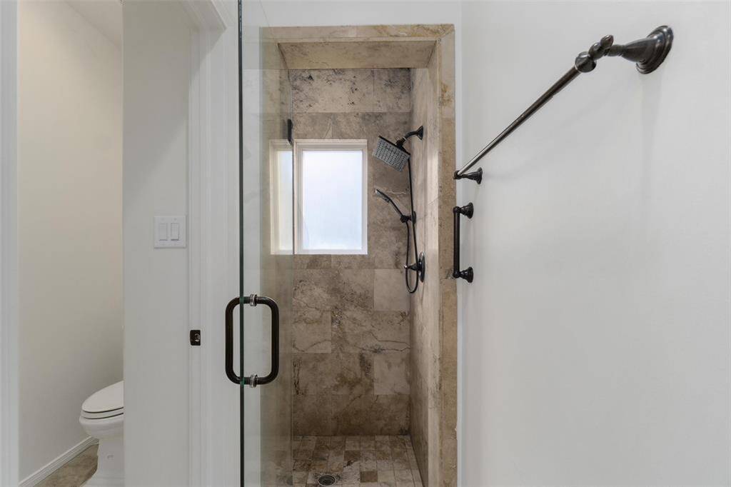 Fully tiled stand alone shower in primary en suite