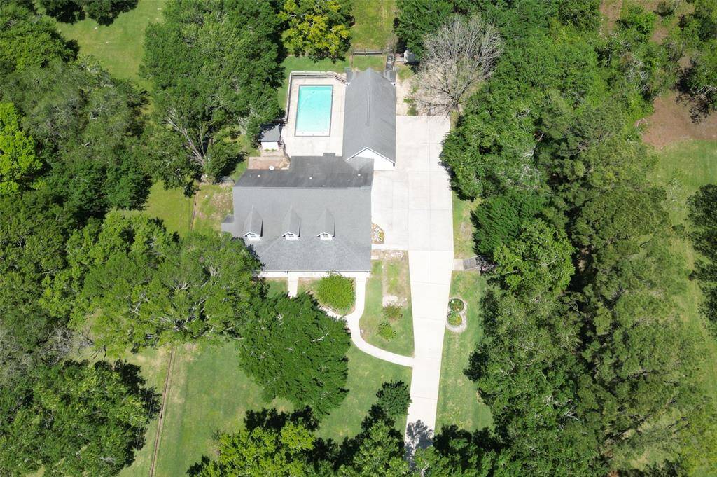 Back yard with pool, 2 stall stables and barn