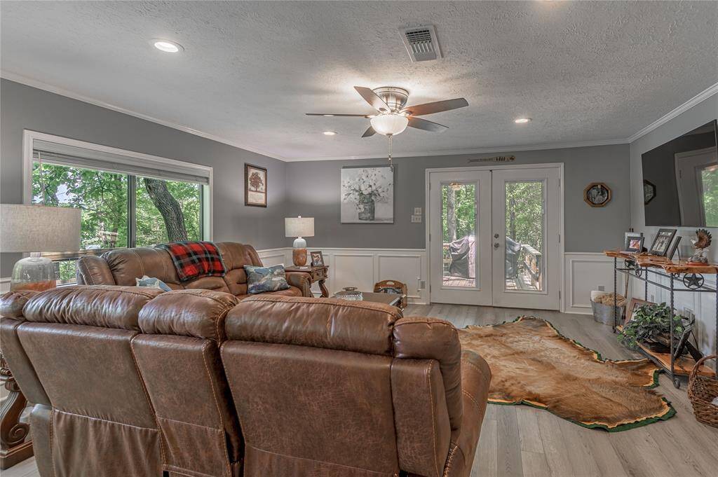 Living room has new flooring through out the kitchen and is waterproof.
