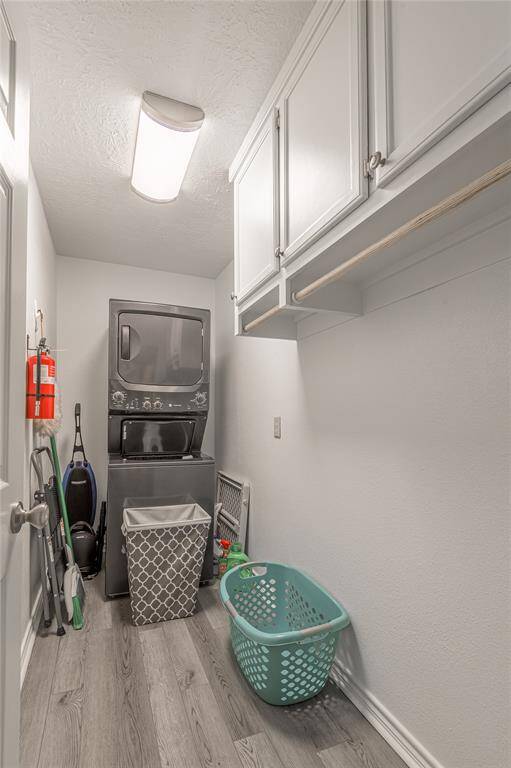Utility room has GE stackable washer and dryer not even 5 yrs old that will remain in the home at list price.