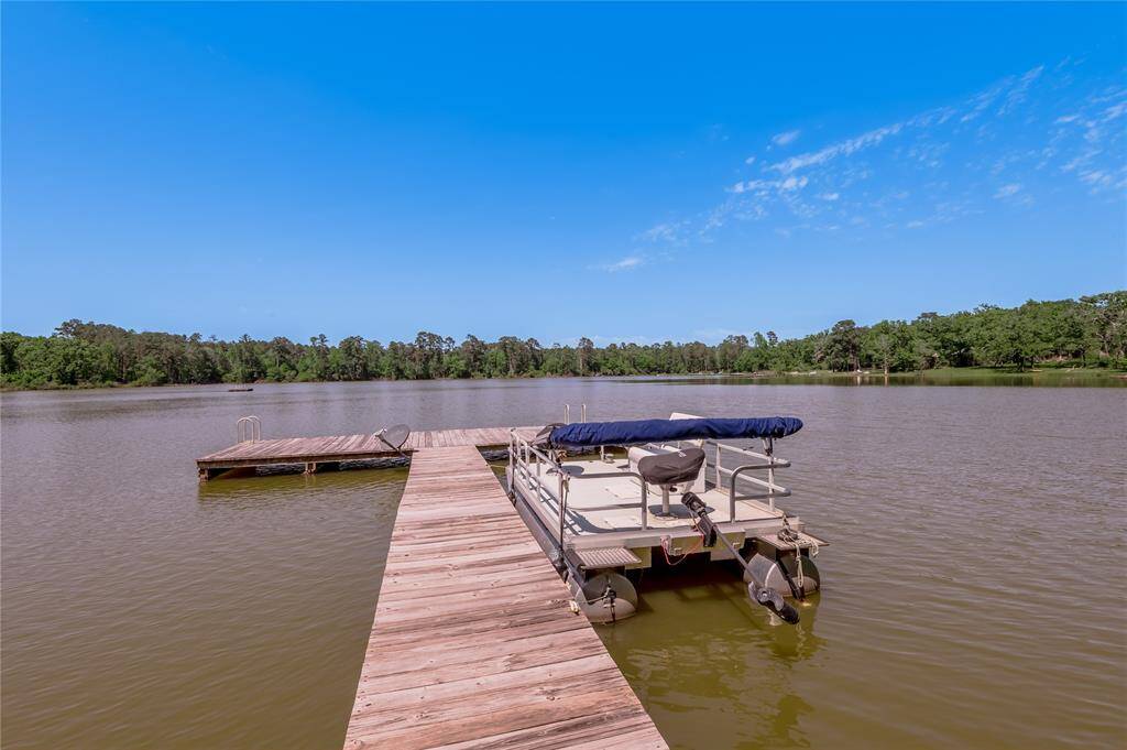 The pontoon boat (24 amp) with trolling motor will go with the list price of home.