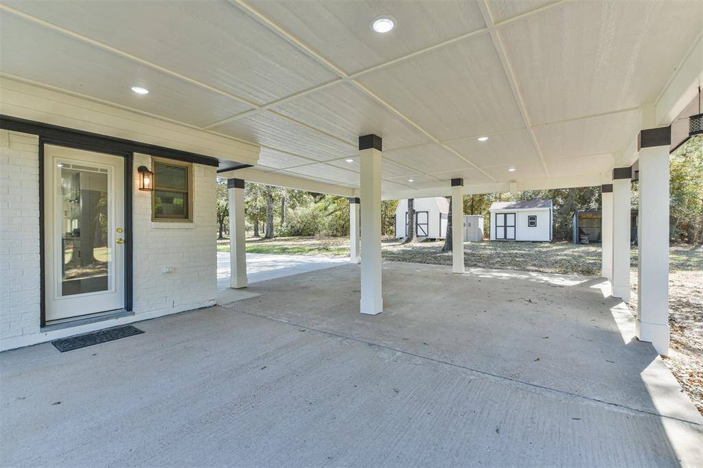 Large back patio has so much potential!