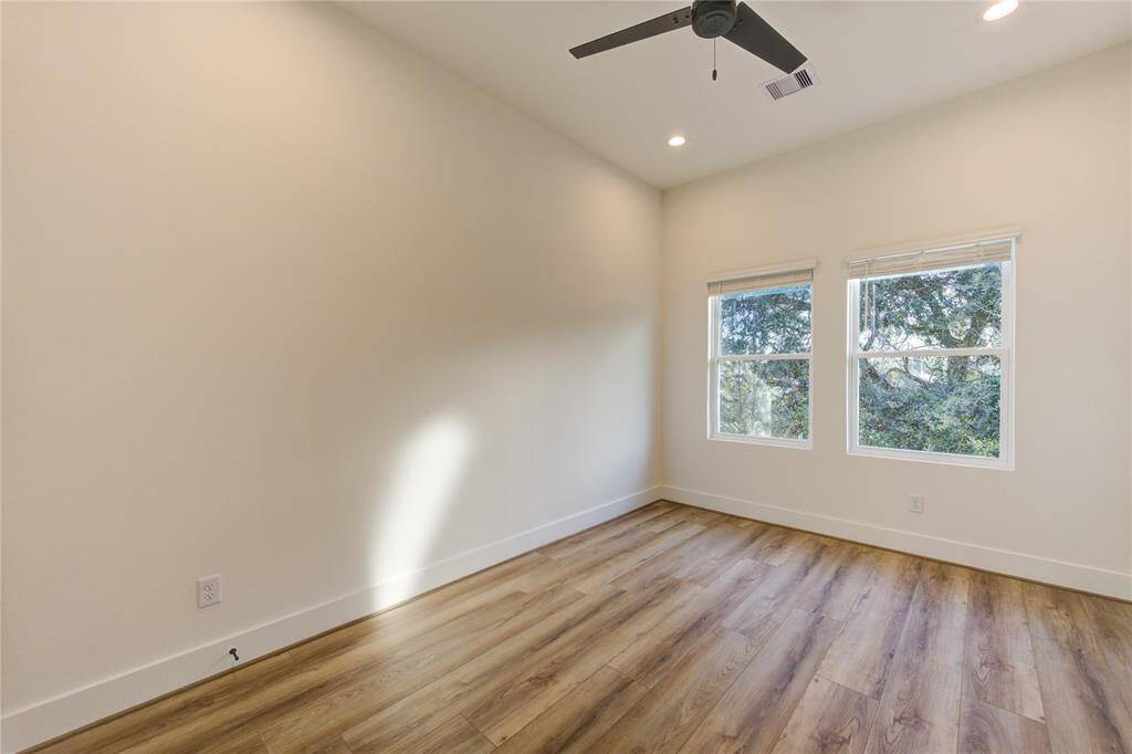 Bedroom 1. All bedroom feature ceiling fans pre-installed, LED recessed lighting, and large closets.