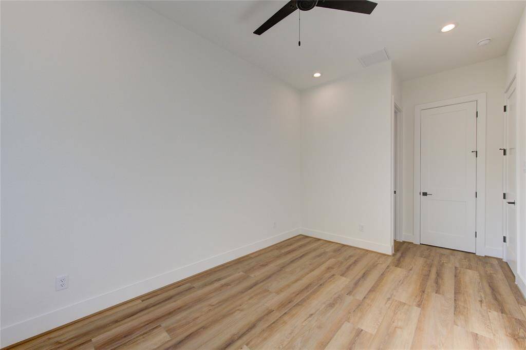 Bedroom 2. All bedroom feature ceiling fans pre-installed, LED recessed lighting, and large closets.