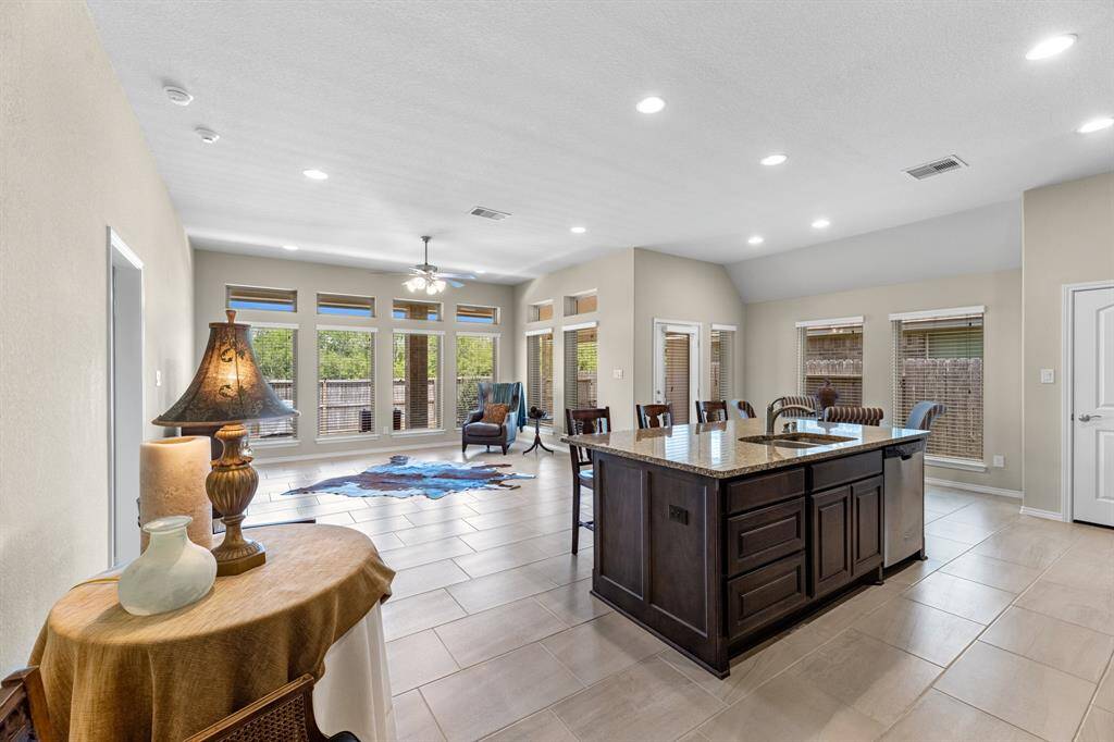 Entering the main living area with an open concept layout with kitchen.