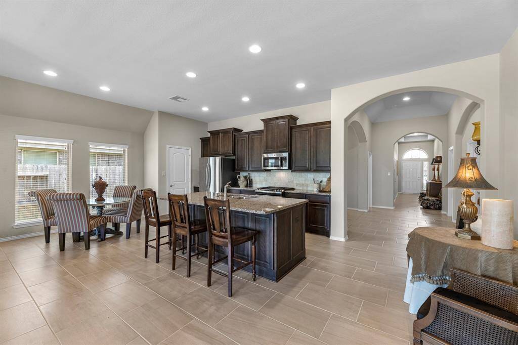 Ceramic tile in all the main areas of the home with the exception of the formal dining room.