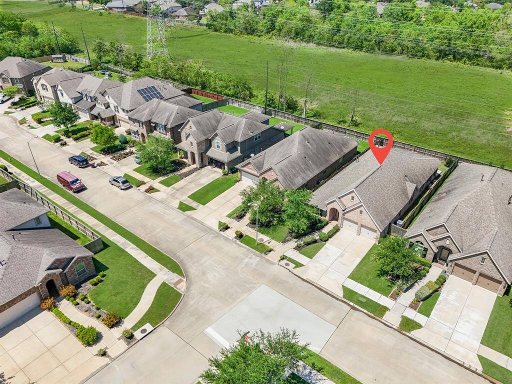 Aerial photo showing property location backing up to a greenbelt with no immediate back neighbor.