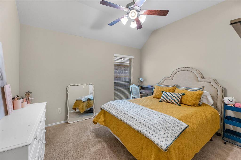 Fourth bedroom is across the hallway with a separate guest wing.