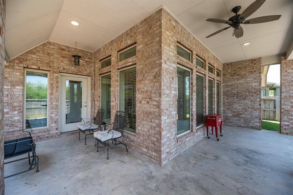 Extended wrap around covered patio.