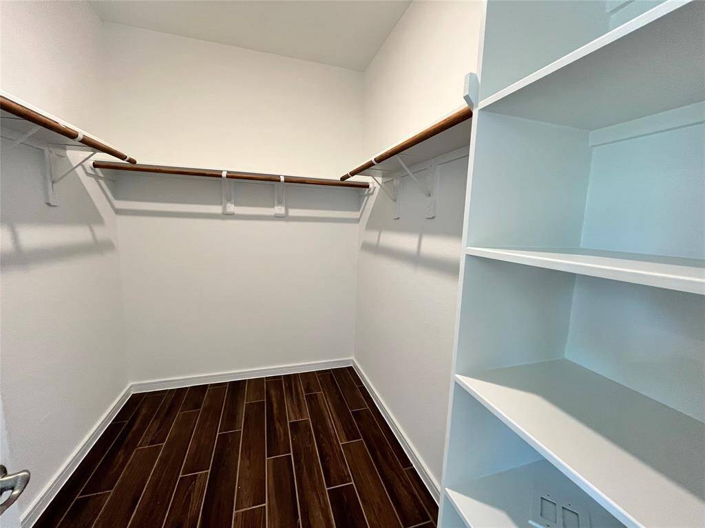 Walk-in closet in the primary suite