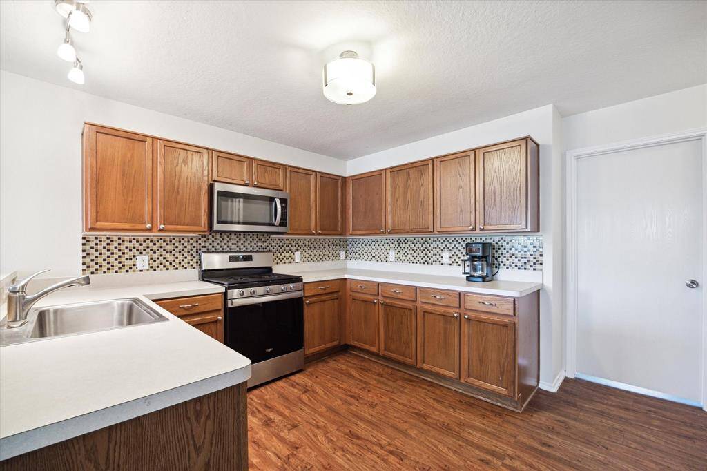 All updated appliances. New gas range, microwave and dishwasher.