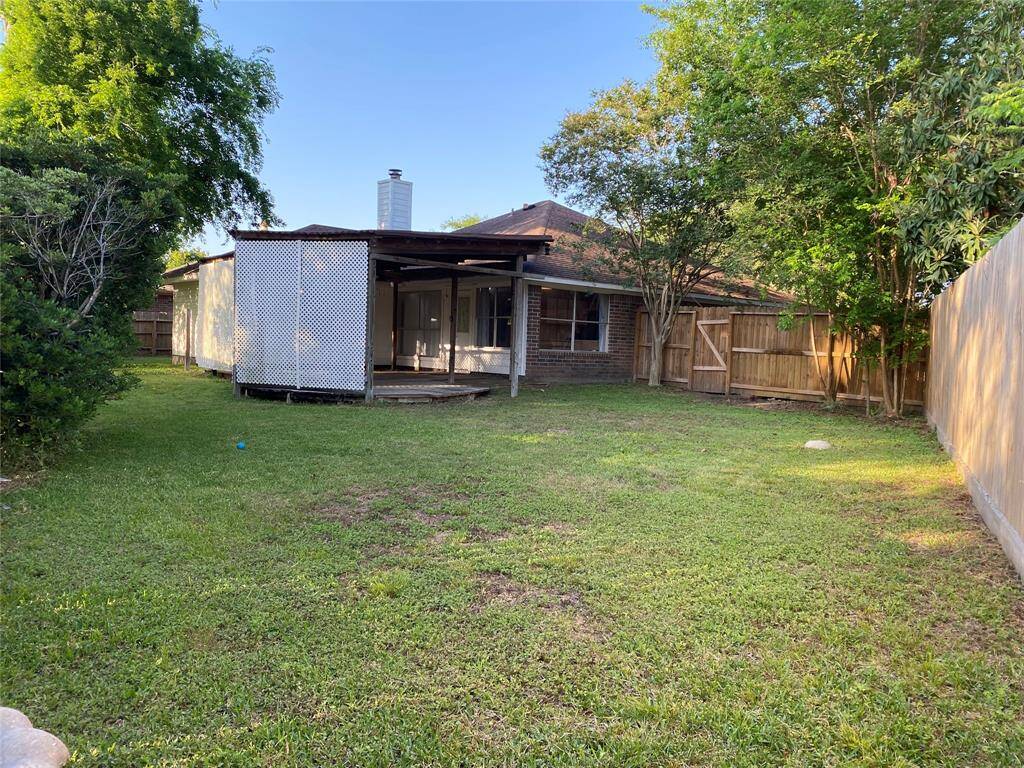 Backyard Patio with Lattice Fence -2nd View