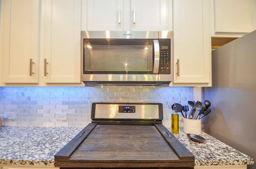 This is a gas cooktop that has a designer cover on it!