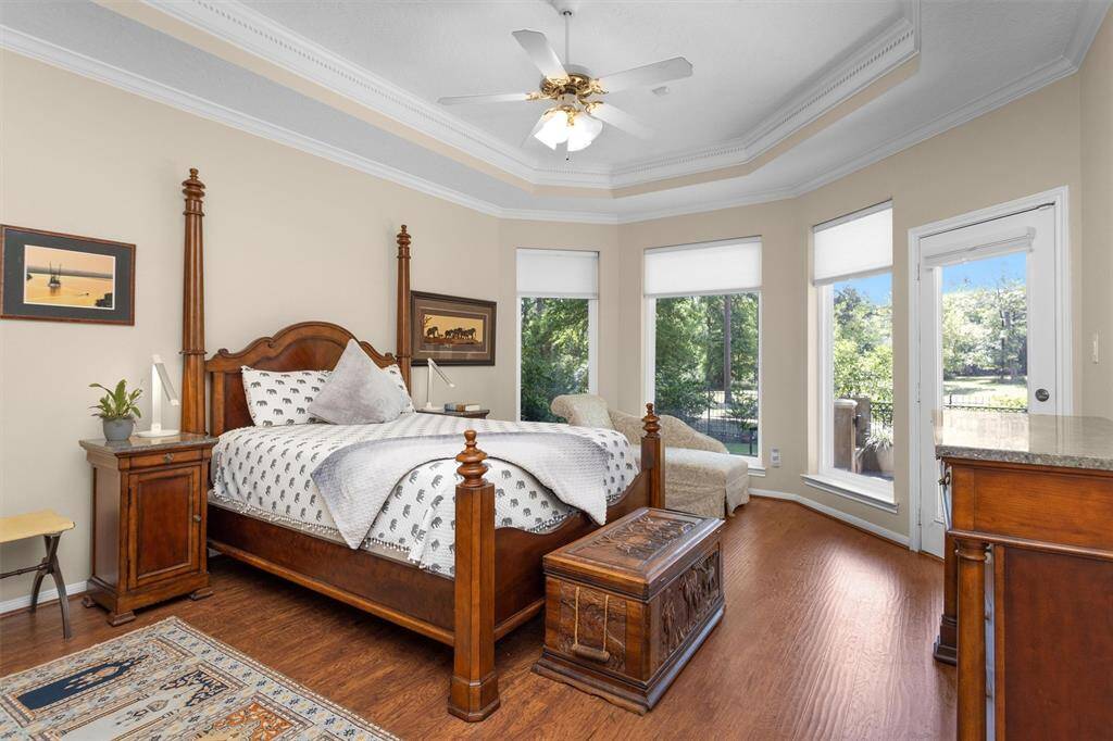 Serene and spacious, the primary suite offers a tranquil retreat with natural light and a layout that accommodates large furniture comfortably.