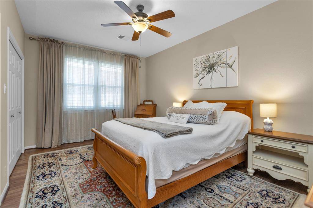 Perfect for guests or family members, this secondary bedroom features ample closet space and a peaceful setting.