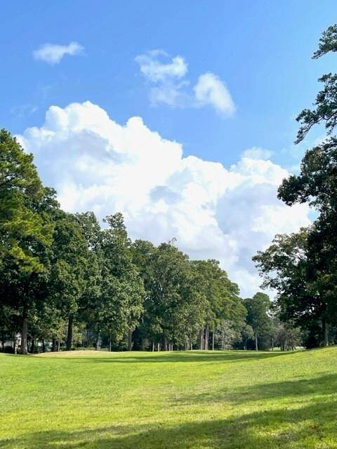 The home does not face a backyard enclosure but instead has an open stunning view with large open manicured lawn areas, paved walks and breathtaking sunsets.