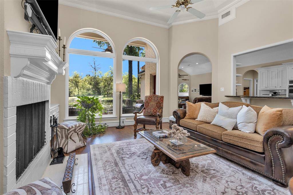 Spacious and versatile living area features elegant tile flooring and a seamless flow into the kitchen—perfect for entertaining or relaxing at the end of the day.