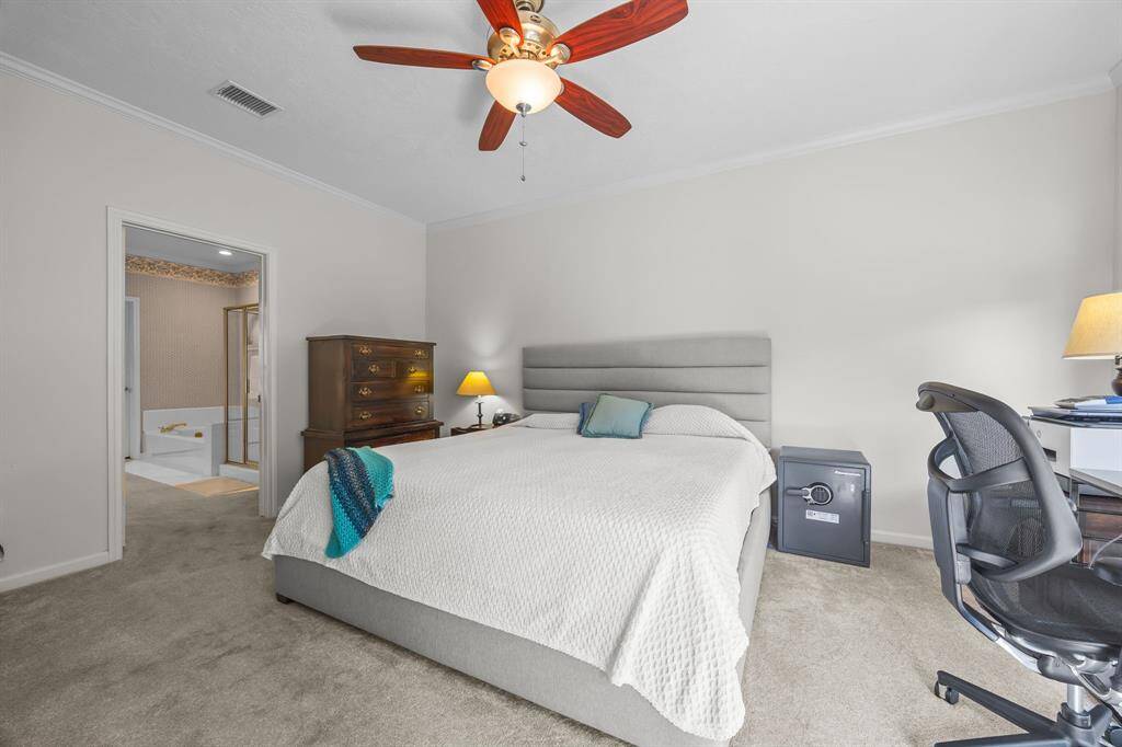 Expansive primary bedroom, perfect for your furniture and style.