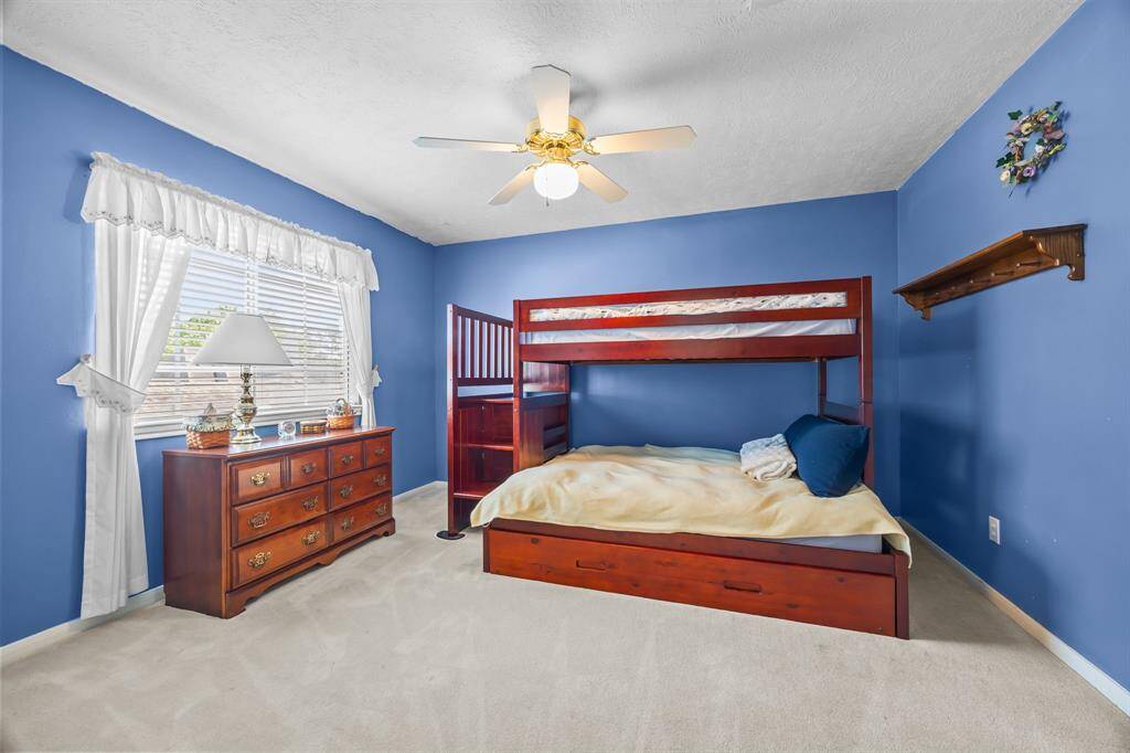 Spacious second bedroom with ample space for your furniture.