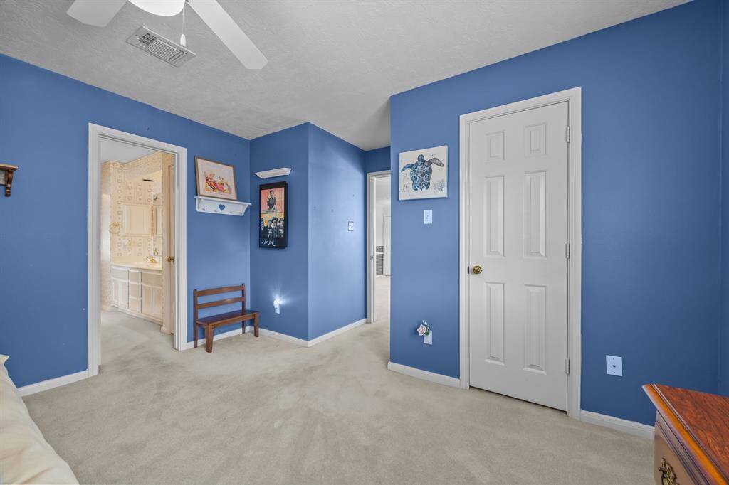 Cozy second bedroom with convenient Jack and Jill bathroom access.