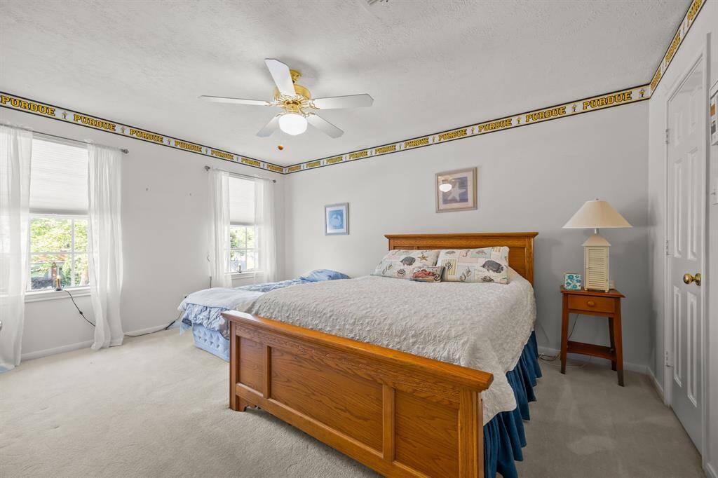 Spacious fourth bedroom with front-facing views, perfect for accommodating guests.
