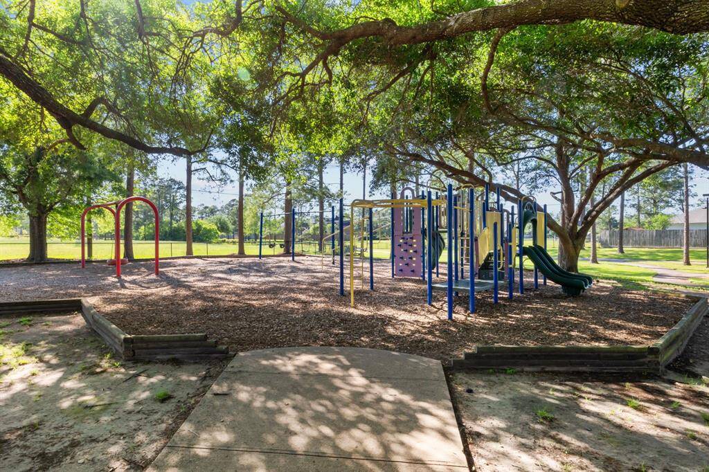 Charming neighborhood park with shaded play areas and open green spaces—perfect for families.