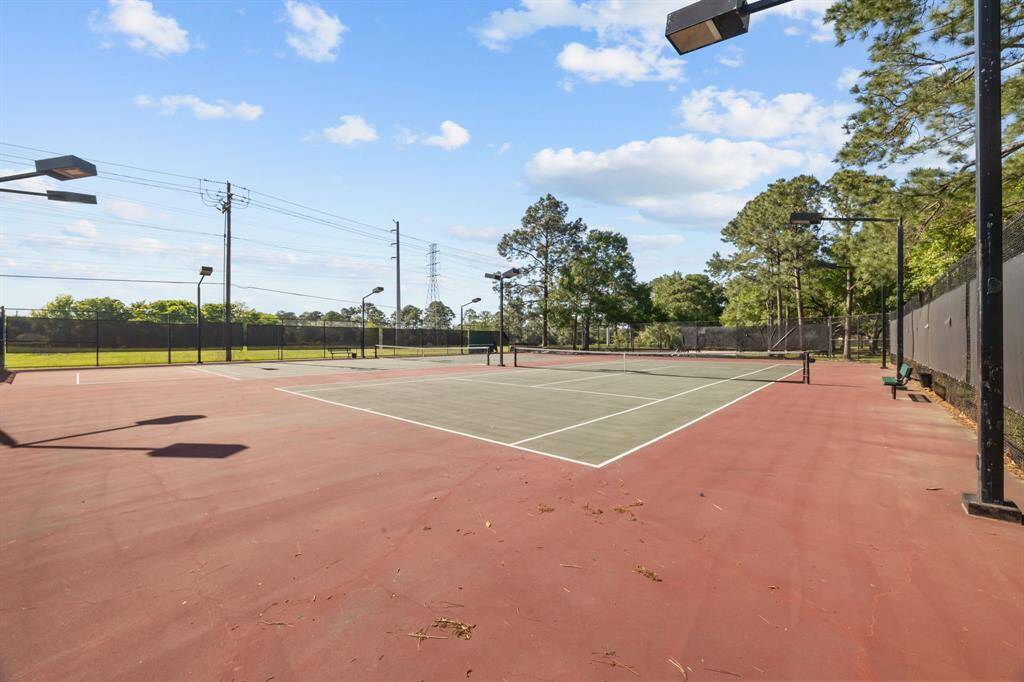 Enjoy active living with access to a community tennis court, perfect for sports enthusiasts.