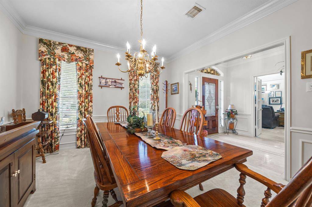 Spacious dining room perfect for hosting summer dinner parties.