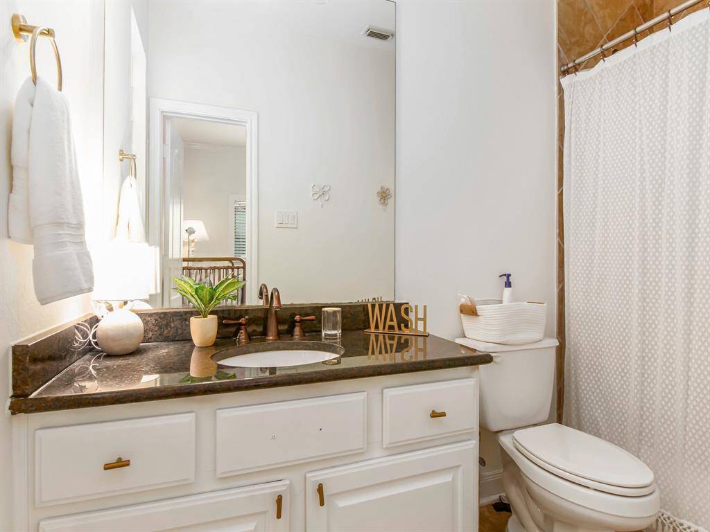 Third ensuite bathroom.
