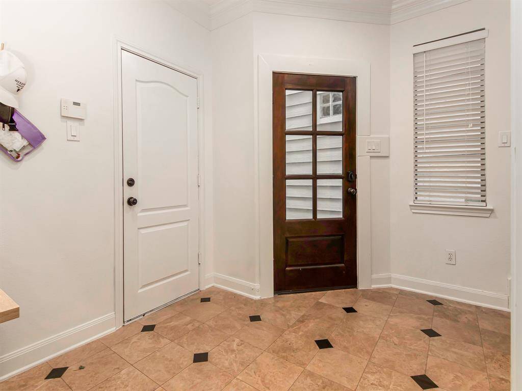 First floor entry/Door to garage.