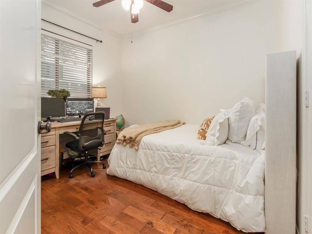 First floor bedroom. wood flooring.