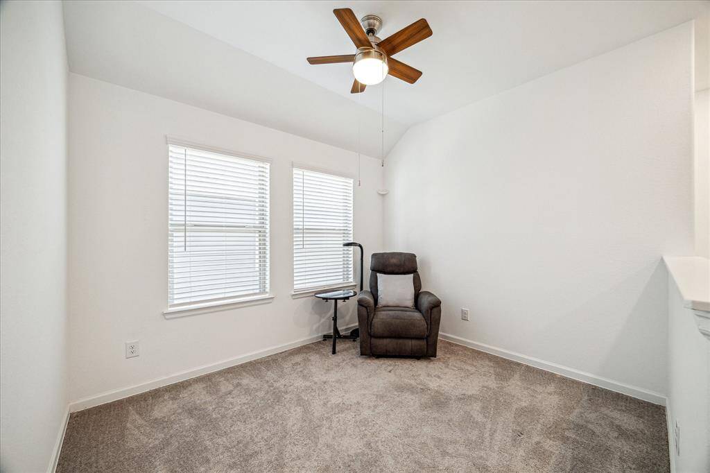 The game room can easily function as a home office.
