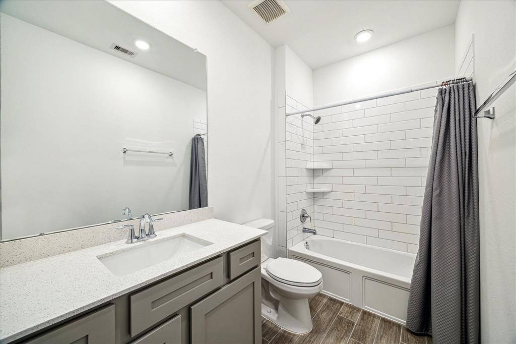 The secondary bath features tub/shower combo and linen closet.