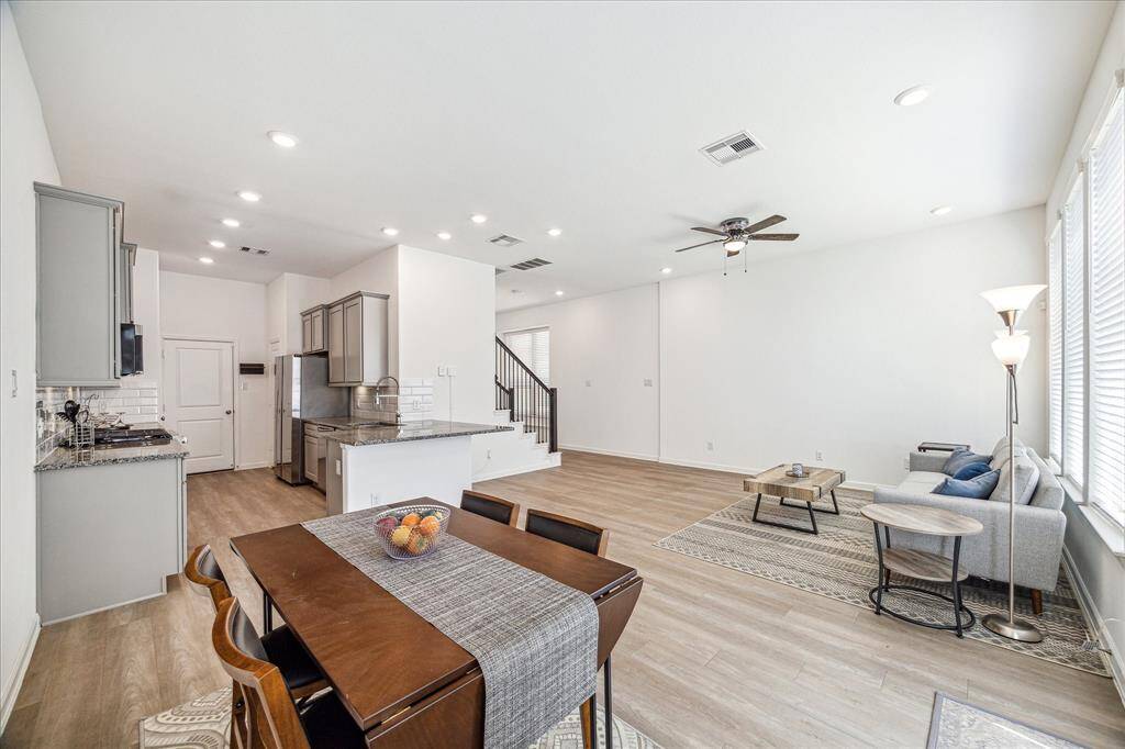 Another view of the living/dining/kitchen areas.