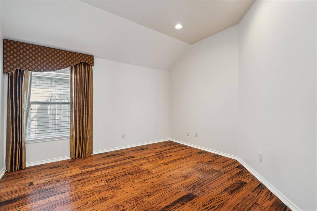 A second view of the flexible game room, showcasing its spacious layout and potential to adapt to your unique needs—whether for work, play, or creativity.