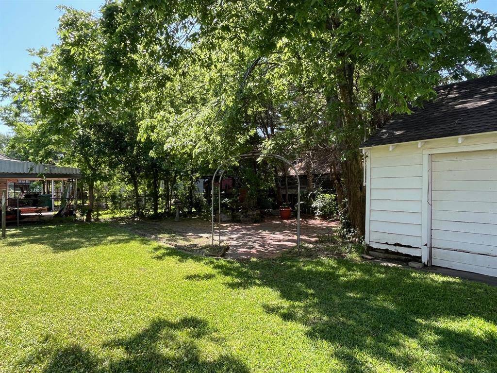 Rear back corner of open lot side