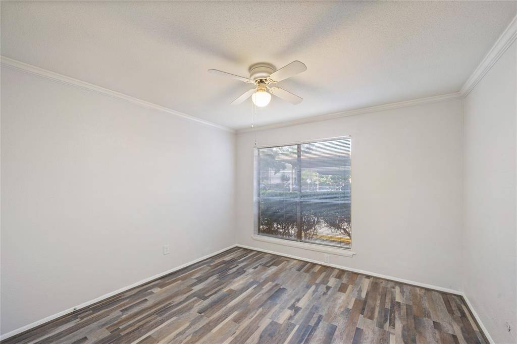 Master bedroom features brand new, updated floor