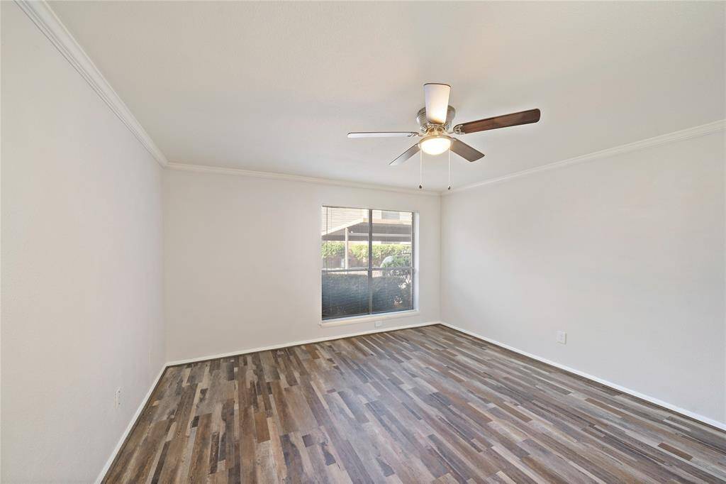 Second bedroom with new flooring.