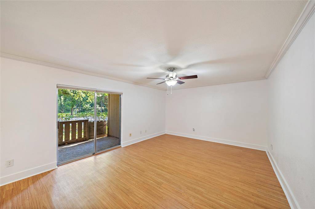 Spacious living area with a lot of natural light.