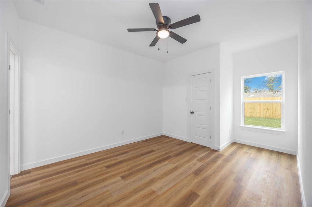 Spacious primary bedroom with en suite bathroom.