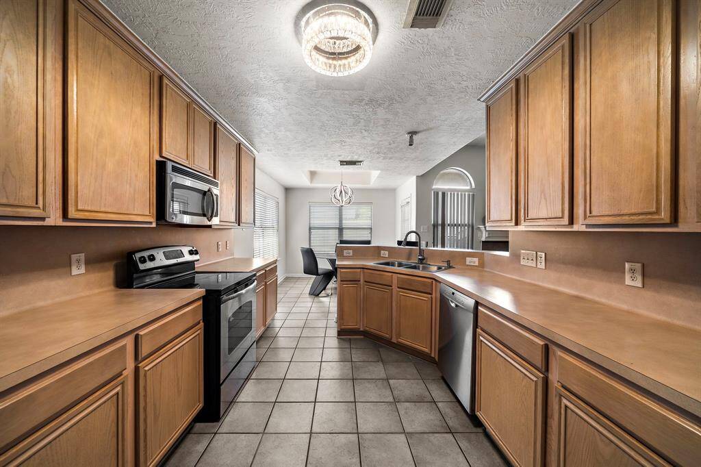This kitchen offers great storage and a functional layout