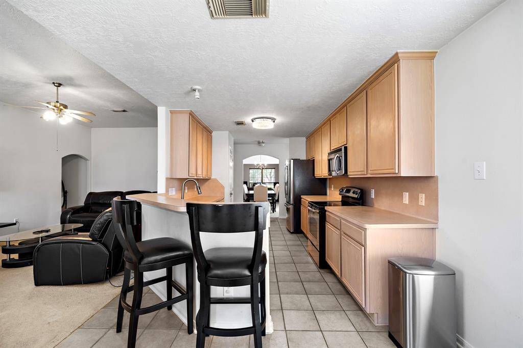 Open kitchen and living area with a comfortable layout.