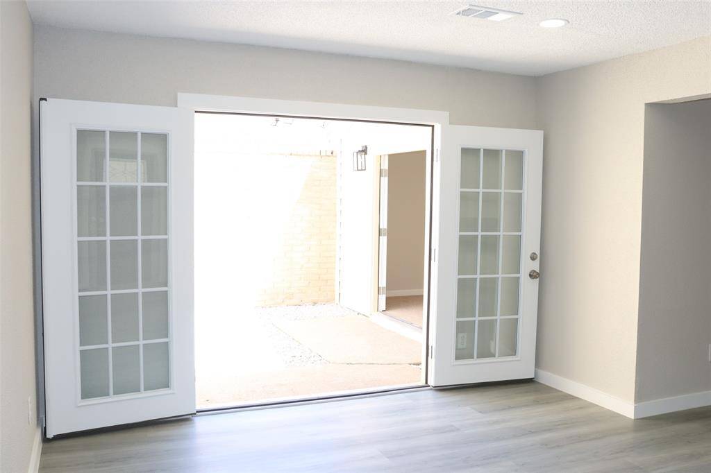 Open Coartyard Door View from Dining Room