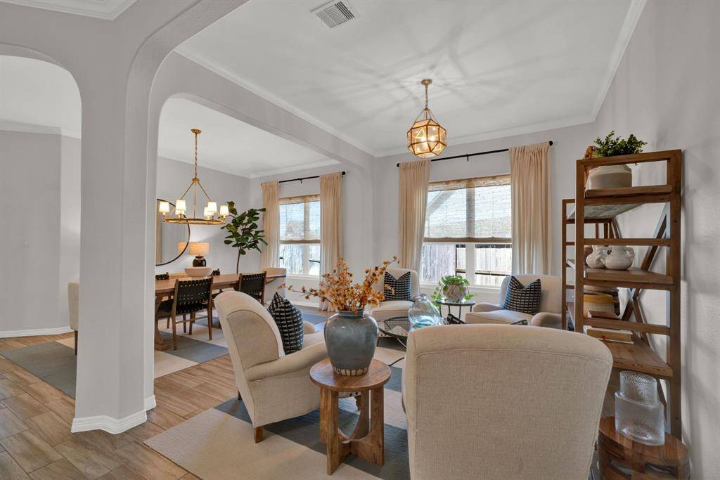 Formal living room could also serve as a study