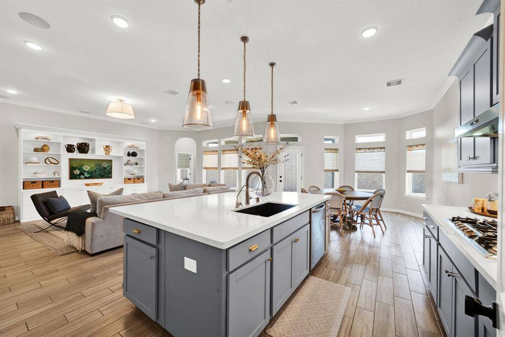Quartz countertop make this kitchen stand out.
