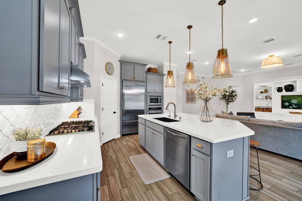 Gas cooktop and water filtration system are some of the amenities that you can enjoy. The refrigerator is included with the house.