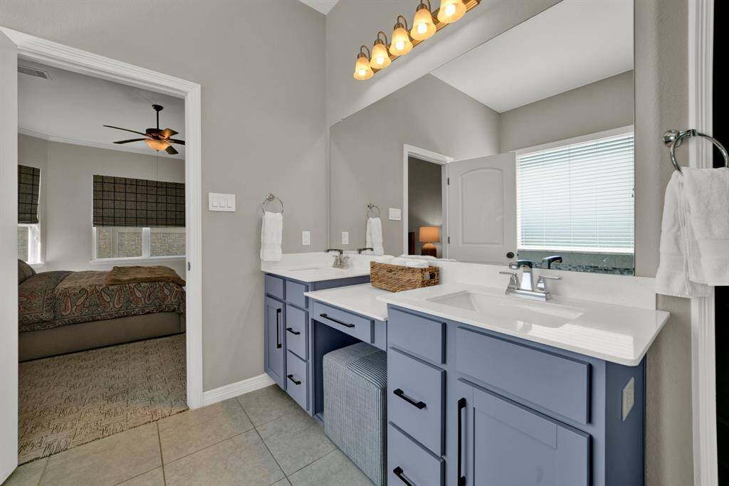 Double vanities are part of this main bathroom