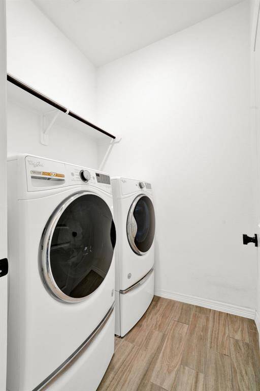 Easy access to the laundry room with space for those big machines. Gas and electric hook ups.